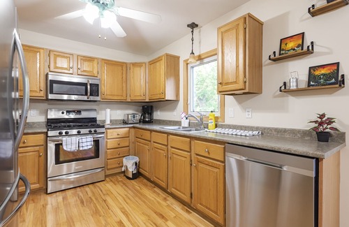 LaSalle House | Inviting Bungalow for 13 with Pool, Spa & Tesla Charger
