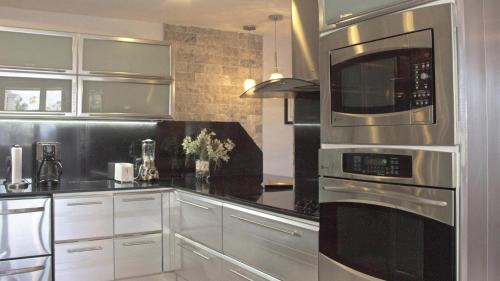 Condado Apartment | Chef's Delight: Family-Friendly 4-Star Escape Awaits
