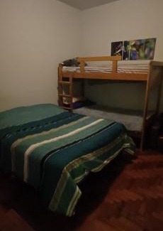 Vicente Lopez House | Relax at Chenille House: Cozy Hostal with Garden & AC