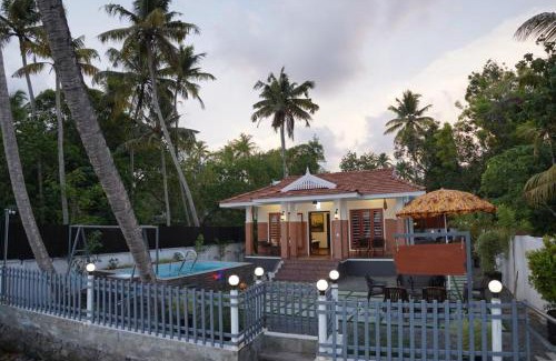 North Paravur Villa | Relaxing Cherai River View Pool Villa with Oceanfront Bliss