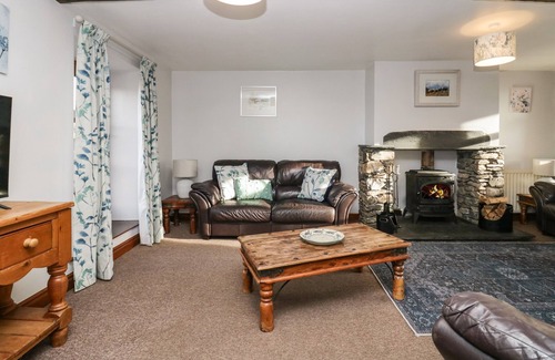 Penny Bridge Cottage | Pet-Friendly Cherry Tree Barn with Cozy Open Fire