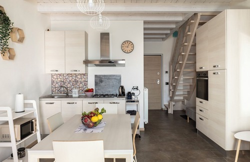 Parzanica Apartment | Cherubino 2 - Three-room apartment with pool and lake view