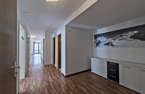 Champfer Apartment | Elegant Chesa Bellavista: Poolside Retreat in Champfer