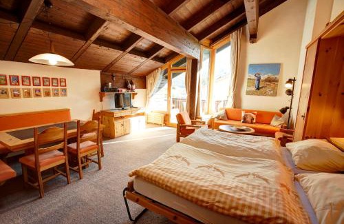Silvaplana Apartment | Pet-Friendly Getaway at Chesa Munteratsch - 4-Star Comfort