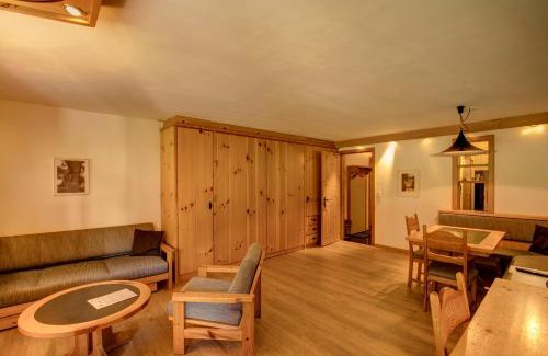 Silvaplana Apartment | Chesa Munteratsch: 4-Star Retreat with Child-Friendly Comfort
