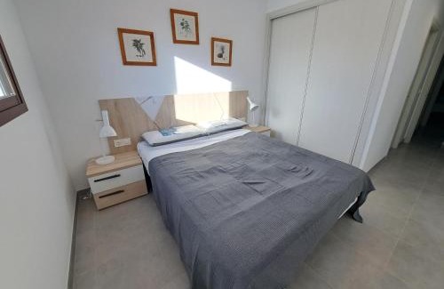 Mar de Pulpi Apartment | Discover Chez Titi: Poolside Escape with 10/10 Ratings