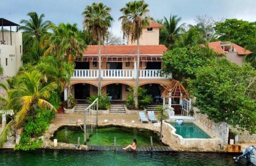 Puerto Aventuras Hotel | Relax at Chez Waffle Hotel with Oceanfront Pool Views