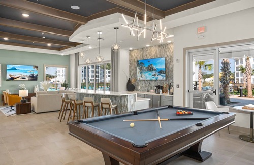 Daytona Beach Apartment | Chic 1BR in Daytona Beach- 24hr gym, pool & grill Near Beach, Speedway & Stadium