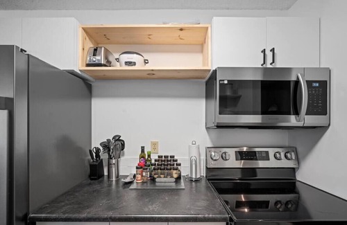 Fort McMurray Apartment | Stylish 2BR Retreat Near Keyano College with Free Parking