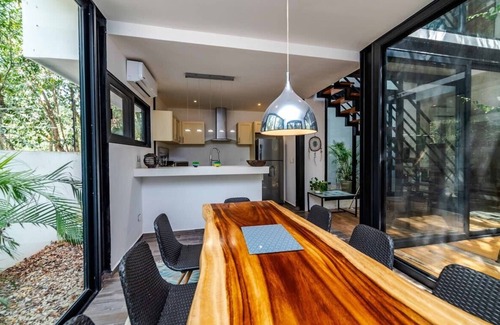 Ek Balam Village House | Stylish 3-Level Retreat at MUN with Rooftop Pool & Deck