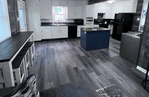 Topeka House | Stylish 3BR Home with Pool & Breakfast in Topeka