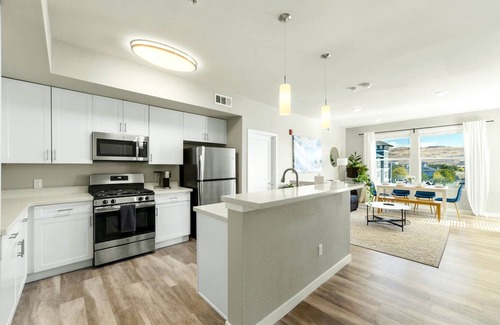 Sparks Apartment | Trendy Apartment with Jacuzzi, Pool, & Mountain Views