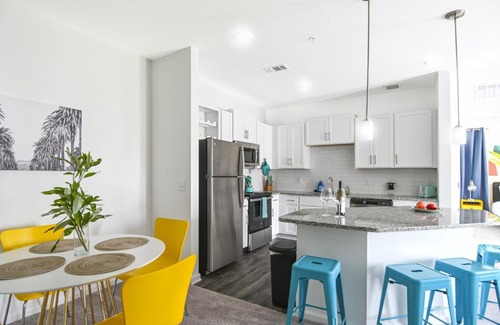 Orange Park Apartment | Chic Haven: Poolside Escape Steps from the Beach