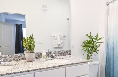 Orange Park Apartment | Chic Haven: Poolside Escape Steps from the Beach