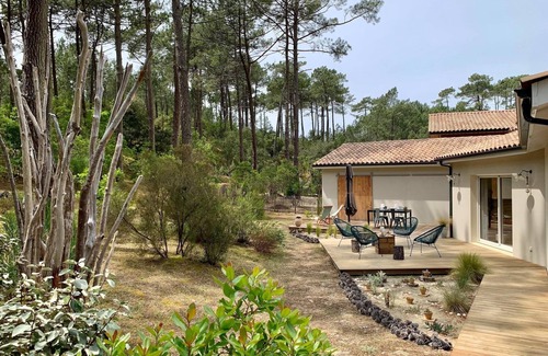 Maubuisson House | Private Garden Retreat with Ocean View & 10/10 Guest Rating