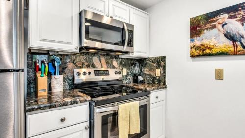 Juno Beach Apartment | Chic Seaside Condo in Juno Steps onto the Beach