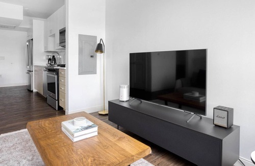 Newtonville Apartment | Chic studio w/ Gym, W/D, Steps from Newtonville Train by Blueground