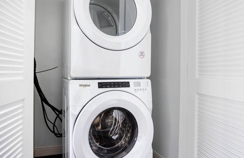 Newtonville Apartment | Chic studio w/ Gym, W/D, Steps from Newtonville Train by Blueground