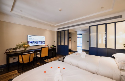 Guangning County Hotel | Unwind at Chikan Gu Zheng Mei Tang Hotel with Pool Access