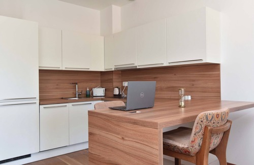 Podmaine Apartment | Relax at Chill and Go Aparthotel with Ocean Views