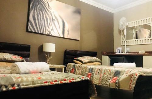 Vivo Cabin | Discover Chinaka Game Lodge: Relaxing Pool & Spa Retreat