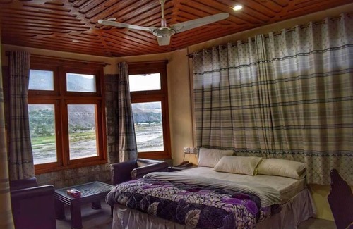 Chitral House | Cozy Chitral Guest House: Family-Friendly with Breakfast Included