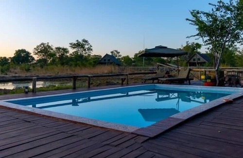 Chobe District Cabin | Discover Chobe Mupani Forest Lodge: Family-Friendly Retreat