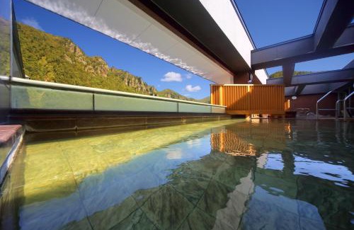 Kamikawa Hotel | Choyo Tei: Family-Friendly Retreat with Hot Tub & Dining