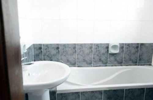 Port Harcourt Cabin | Relaxing Stay at Christine Apartment Hotel with Pool & Hot Tub