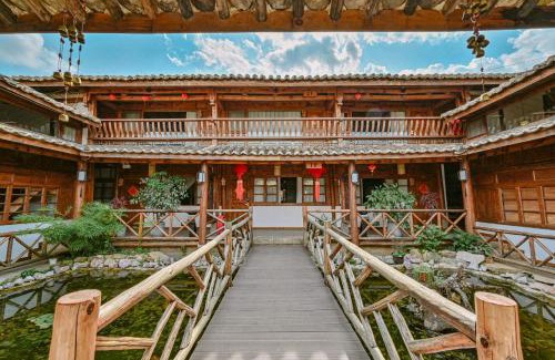 Guandu House | Exceptional Chunjian Guesthouse: 5-Star Retreat with Pool