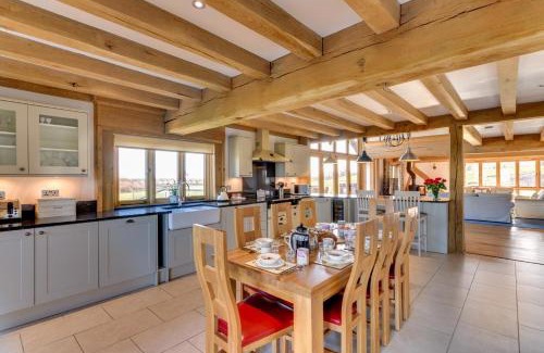 Stone in Oxney House | Welcoming Churchlands Barn with Hot Tub & Family Amenities