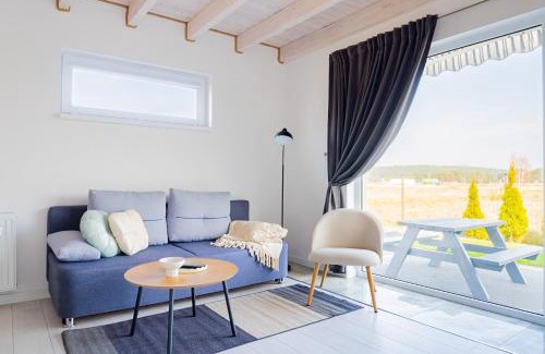 Karwienskie Bloto Drugie Apartment | Peaceful Cichy Domek: Pool, Playground & Pet-Friendly Stay