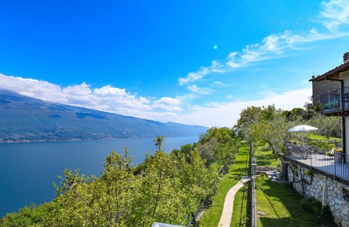 Tignale Apartment | Experience Ciliegia: Scenic Lake View with Family-Friendly Perks