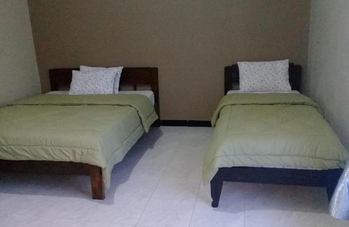 Bajawa House | Discover Cinnamon Guest House: Family-Friendly & Cozy Stay