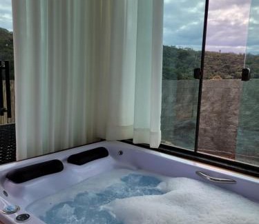 Jaboticatubas Apartment | Pet-Friendly Cipó Lofts with Hot Tub & Perfect 10 Rating