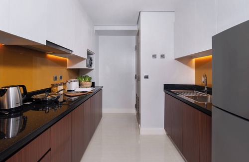 San Lorenzo Hotel | Elegant Stay at Citadines Benavidez Makati - 4 Star Comfort