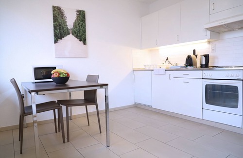 District 8 Apartment | Stylish City Stay Apartments with Spa and Pet-Friendly Services