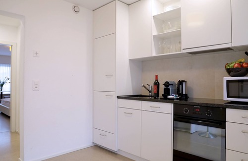 District 8 Apartment | Stylish City Stay Apartments with Spa and Pet-Friendly Services