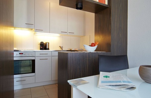 District 8 Apartment | Stylish City Stay Apartments with Spa and Pet-Friendly Services
