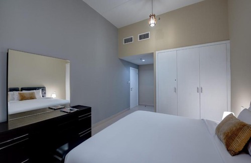 Dubai Investment Park Apartment | Comfortable City Stay Residences with Pool & Family Amenities