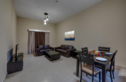 Dubai Investment Park Apartment | Comfortable City Stay Residences with Pool & Family Amenities