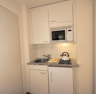District 6 Apartment | Explore PABS Résidences with Kitchen & Wheelchair Access