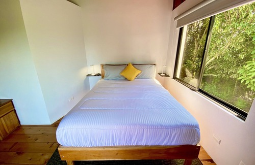 San Isidro Bed & Breakfast | Cozy Bedroom for Two with City View and Spa Amenities