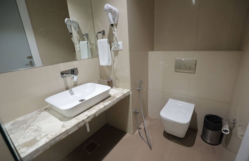 Sanwer Hotel | Discover Comfort at Clarion Inn Indore with Pool & Spa