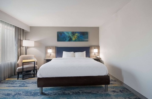Wheatland Hotel | Ideal Clarion Pointe OKC Airport with Pool and Spa Amenities