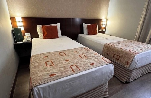 Guaxupe Hotel | Relax at Class Hotel Guaxupé: Pool, Spa & High Ratings
