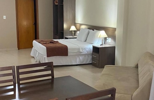 Passos Hotel | Relax at Class Hotel Passos Rio Grande with Pool & Breakfast