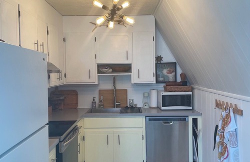 Panacea House | Seaside A-Frame Retreat with Ocean View and Pet-Friendly Perks