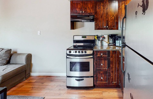 Lac Le Jeune Cabin | Cozy Log Cabin with Full Kitchen & Free Internet Access