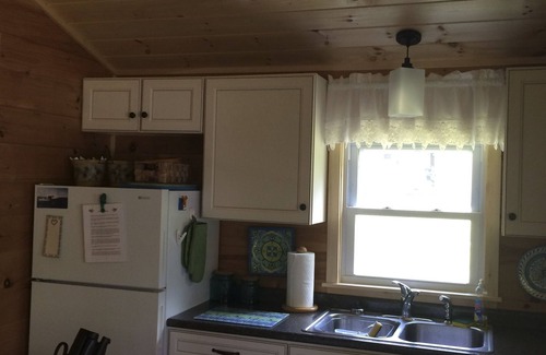 Oxford Cabin | Idyllic Maine Lakefront Cabin with Porch and Canoe Access